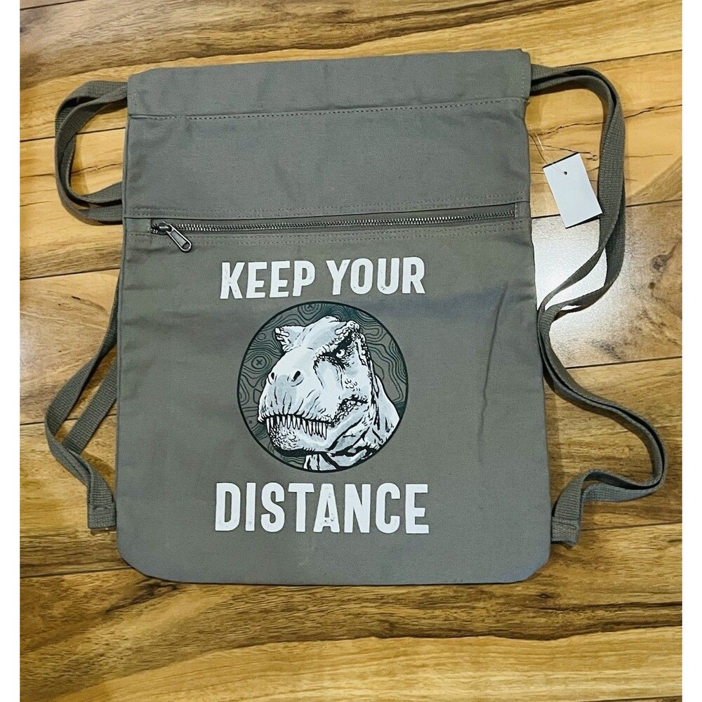 Universal Studios Jurassic Park Keep Your Distance Dinosaur Backpack New